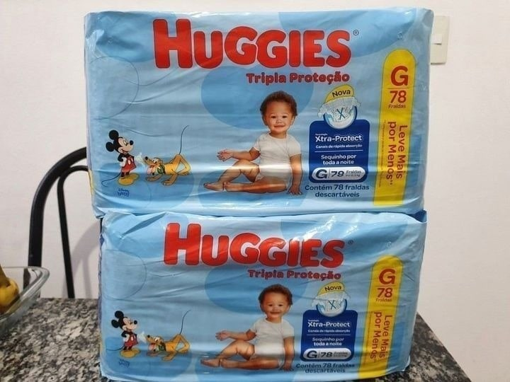 Fralda Huggies Tripla Proteção G com  .78 Fraldas*