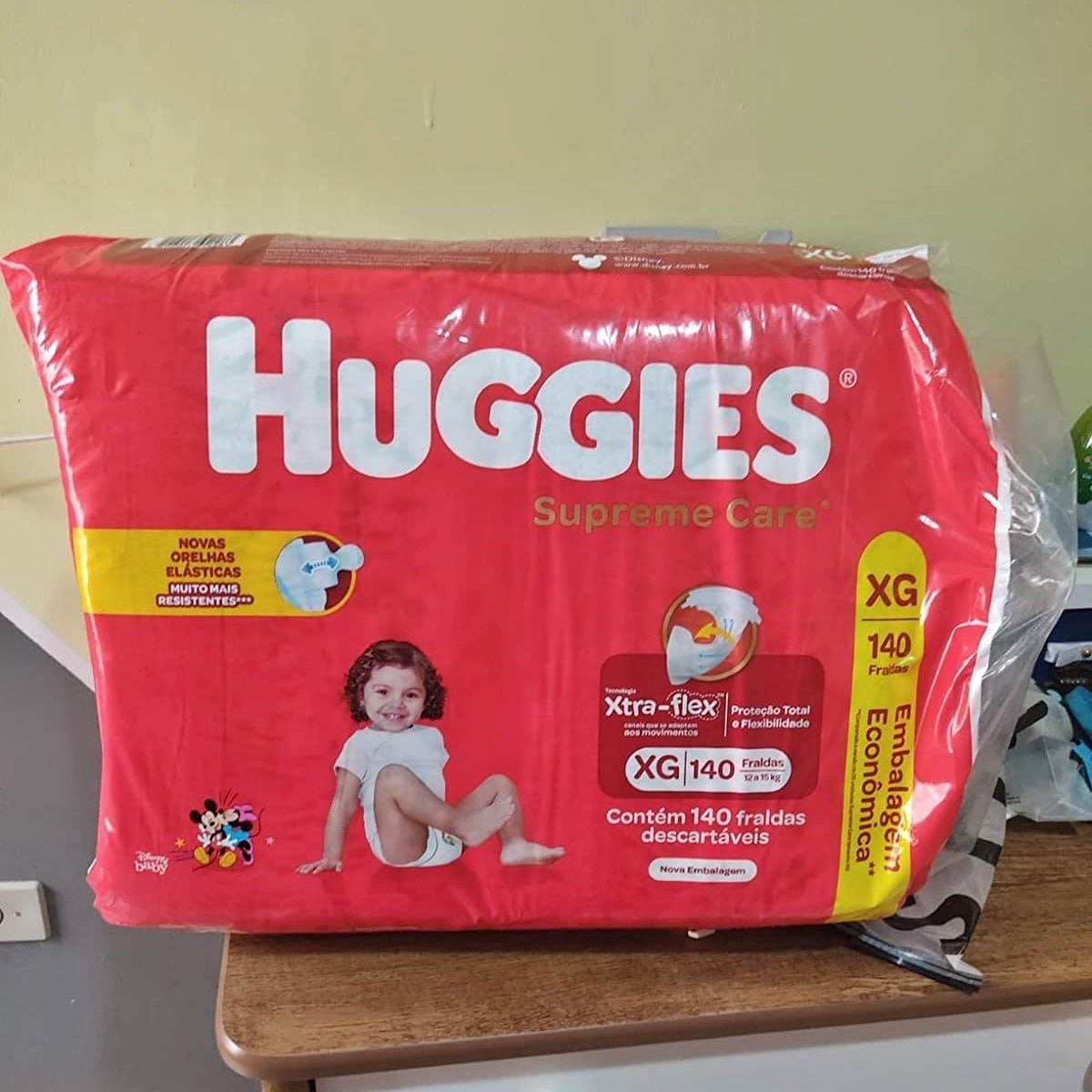 Fralda Huggies Supreme Care XG 140 unidades