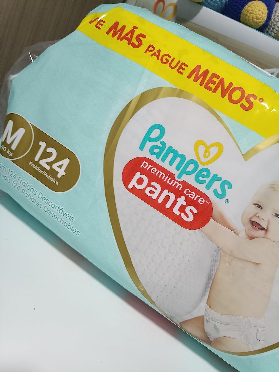 Fralda Pampers Pants Premium Care M 124 unidades, Pacotão