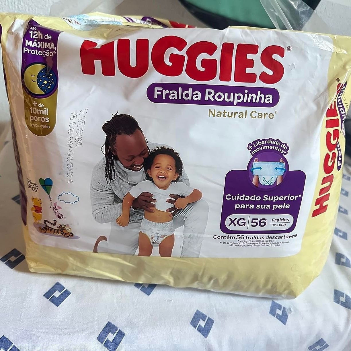Fralda Huggies Roupinha Natural Care XG 56 unidades