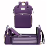 Bolsa Maternidade Multifuncional com Berço Portátil Mochila Impermeável Grande Capacidade para Mamãe e Bebê com Compartimentos Térmicos Organizador de Fraldas e Acessórios Roxa