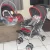 Carrinho Travel System Reverse + Bebê Conforto Cosco Vermelho