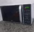 Micro-ondas Britânia Bmo23 De Preto 20l Branco 127v